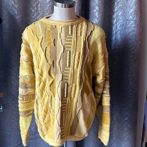 Authentic and GORGEOUS COOGI sweater. Super soft and I’m EXCELLENT condition!